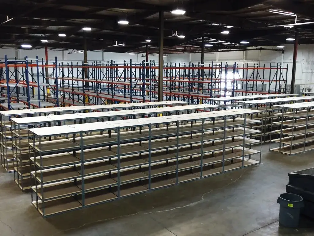 Empty boltless shelving and racking inside of a warehouse